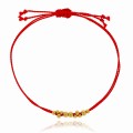 bransoletka stal pozłacane kulki jedwabna nić kolor czerwony