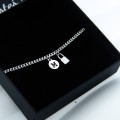 Srebrna bransoletka z literą i kłódką – personalizowana