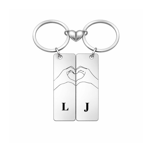 Komplet breloków dla pary kolor srebrny dłonie układające się w serce prezent dla zakochanych